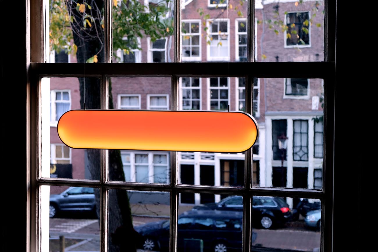 Graypants Sunne fixture near a window