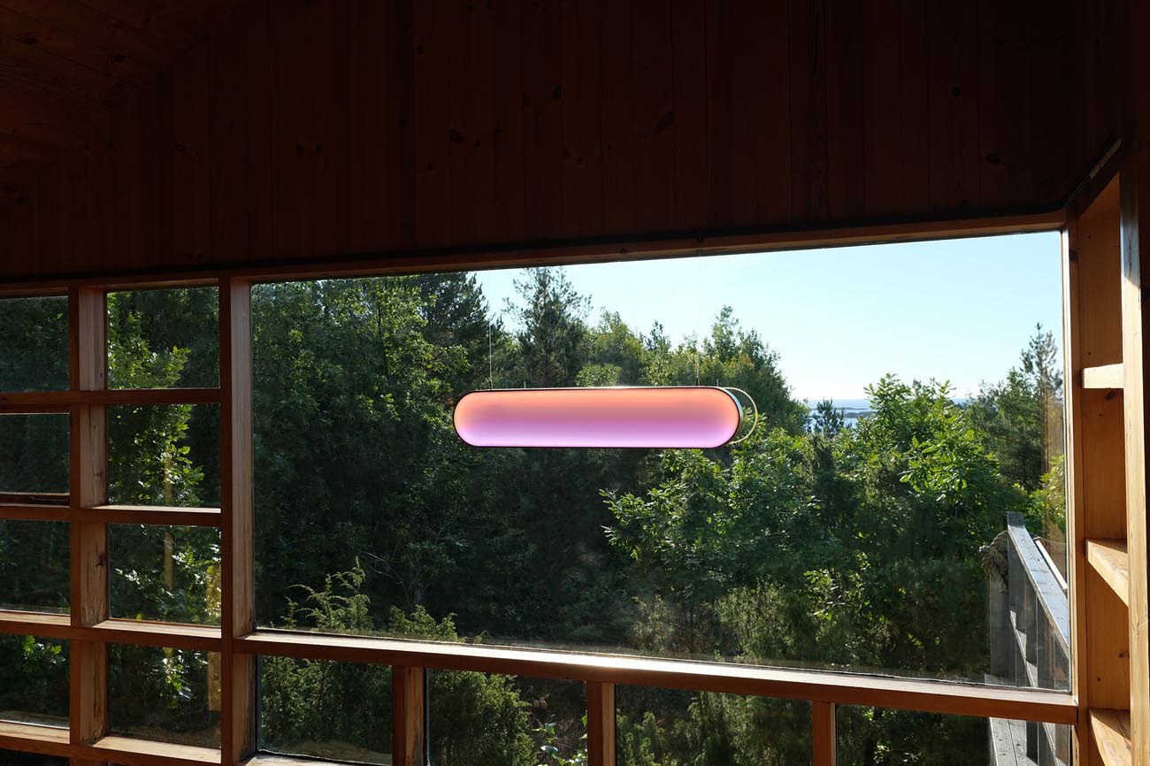 Graypants Sunne fixture near a window