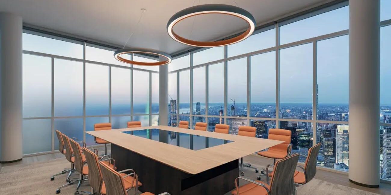 Arkus by ALW Arkus by ALW ring light hanging above a boardroom table