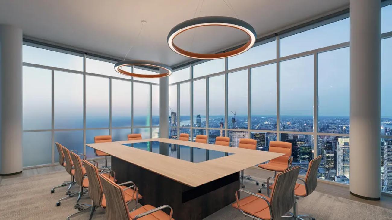 Arkus by ALW ring light hanging above a boardroom table