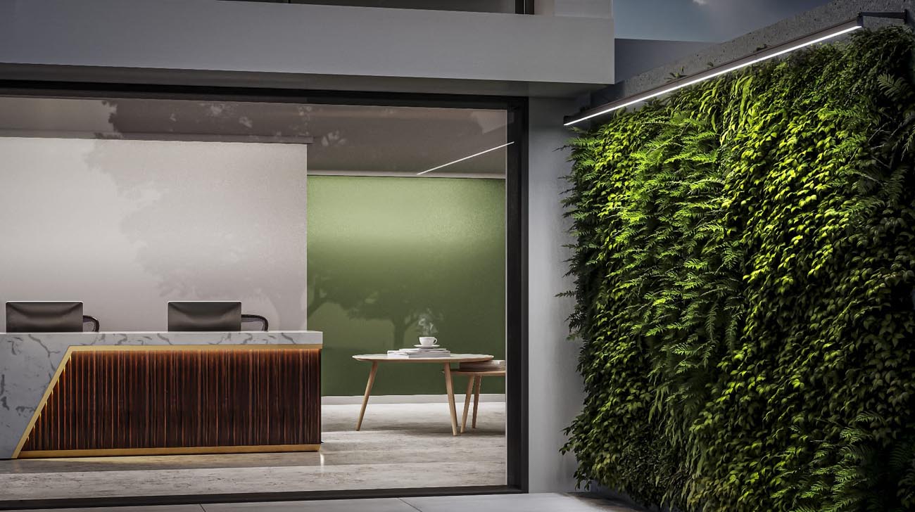 iGuzzini Linealuce 27 installed over a plant wall