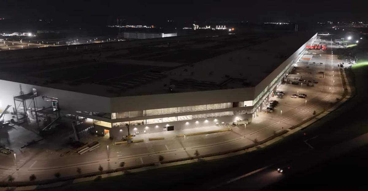 SHIELD+ Series by Performance iN Lighting wallpack fixtures installed outside of a warehouse