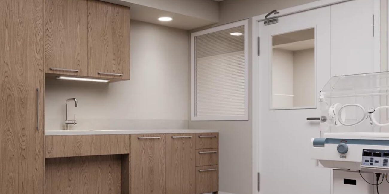 Fail-Safe UC1 Antimicrobial Undercabinet by Cooper Lighting Solutions Cooper Lighting Fail-Safe UC1 Antimicrobial Undercabinet fixture installed over a sink in a laboratory.