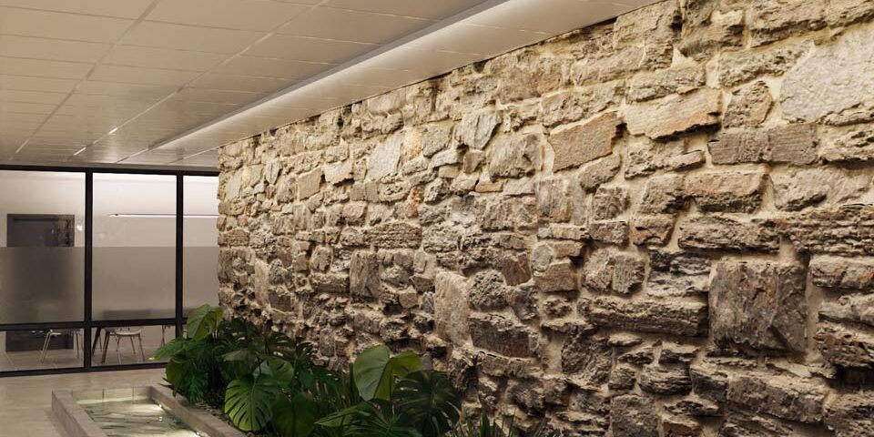 EZT Wall Wash by ARON Lighting Aron Lighting EZT Wall Wash illuminates brick details in an office