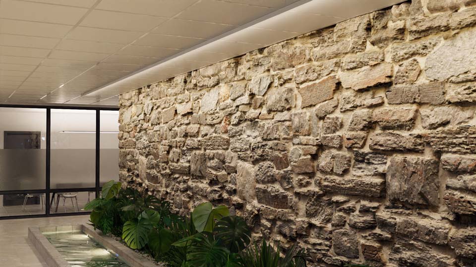 Aron Lighting EZT Wall Wash illuminates brick details in an office