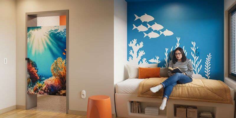 Hitsville Thru-the-Wall Nightlight by Kirlin in a bedroom