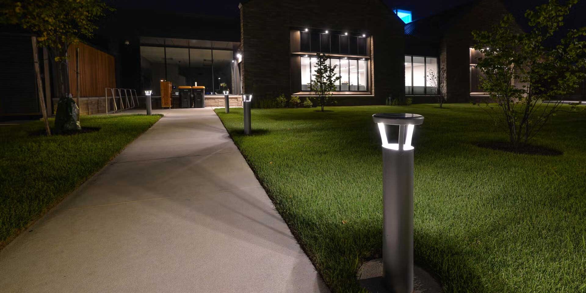 PLB Bollard by FLT PLB Bollards by FLT outside of a building at night