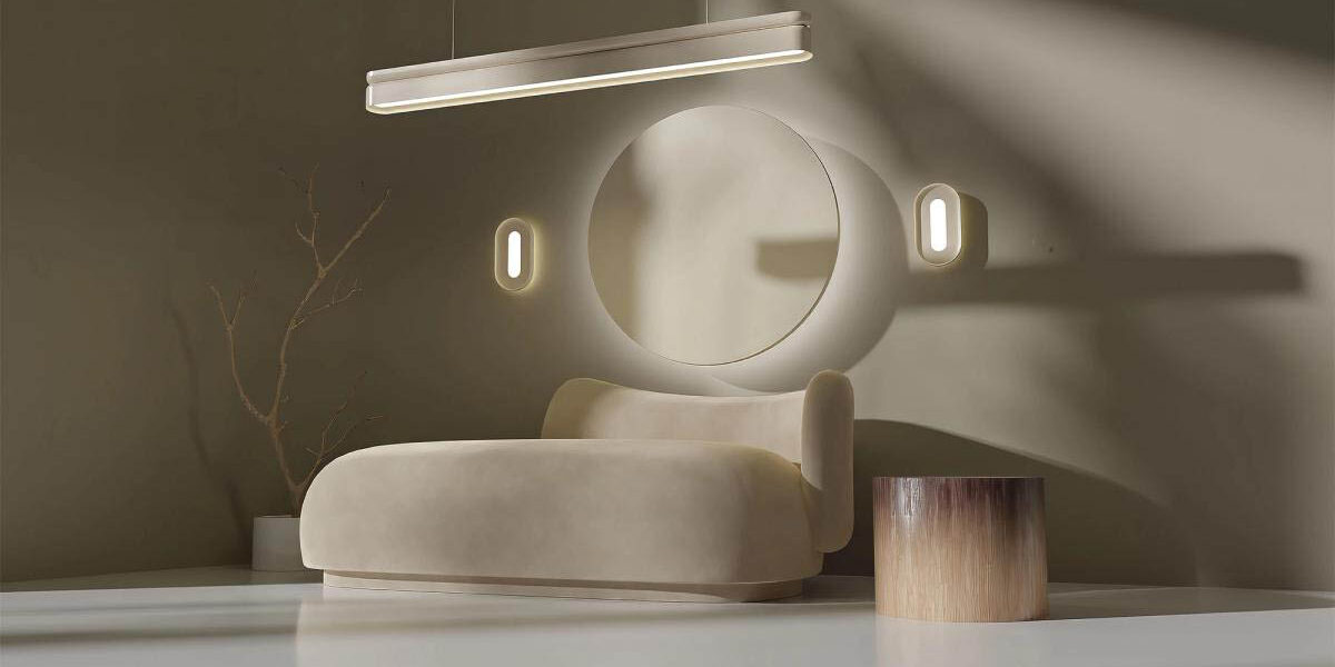 Studio by Nulite A white Nulite studio linear suspended luminaire and two Nulite Studio wall sconces installed over a modern couch