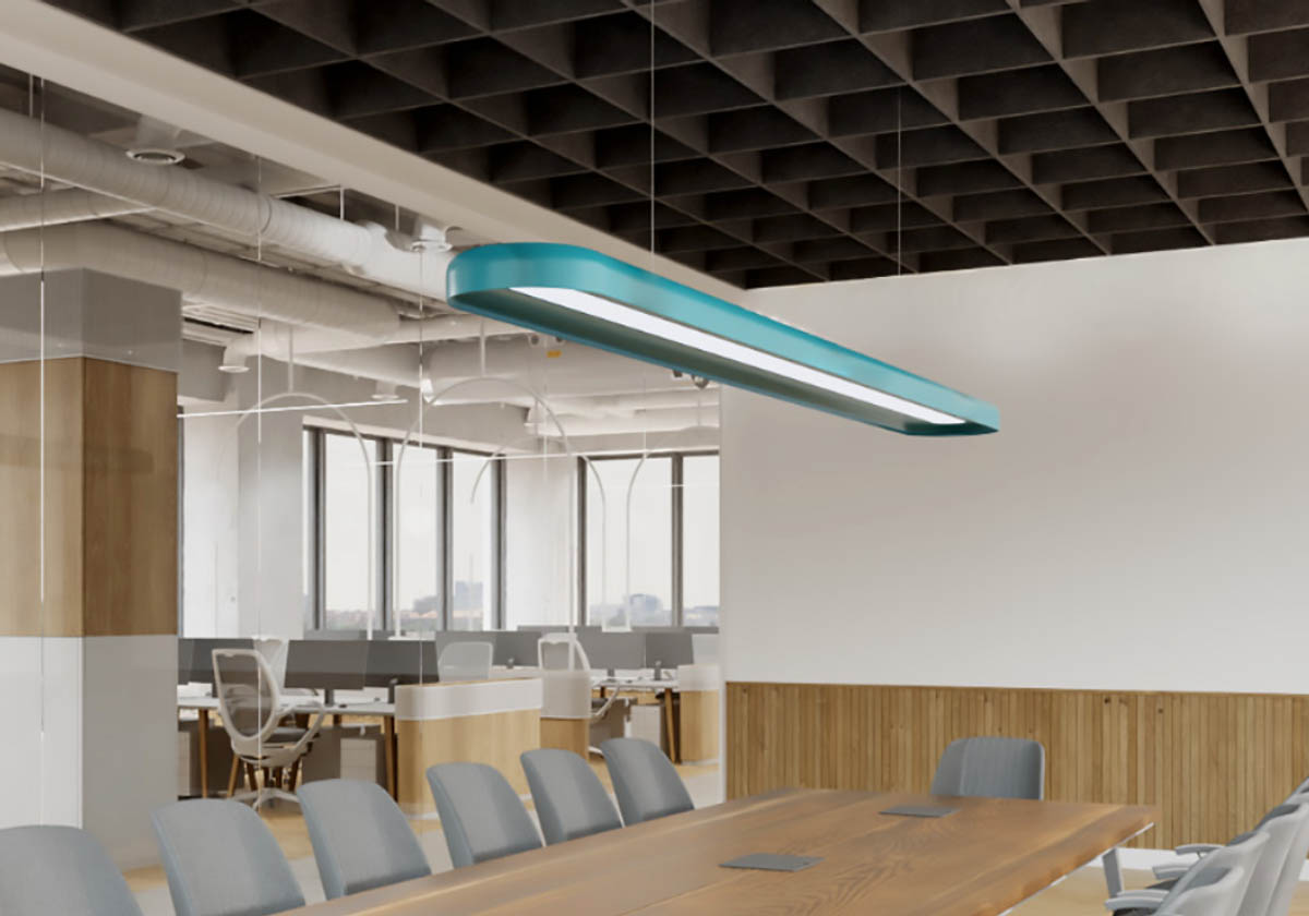 A blue Nulite Studio linear suspended luminaire installed in a boardoom